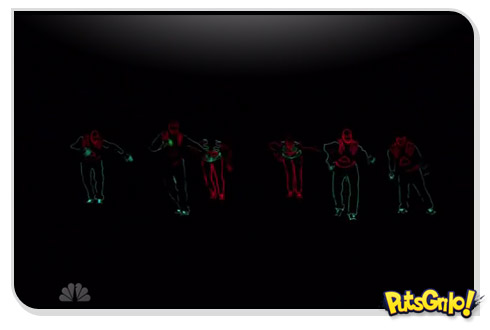 Dança com roupas de neon